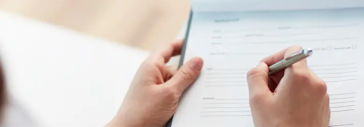 Patient filling out paperwork.